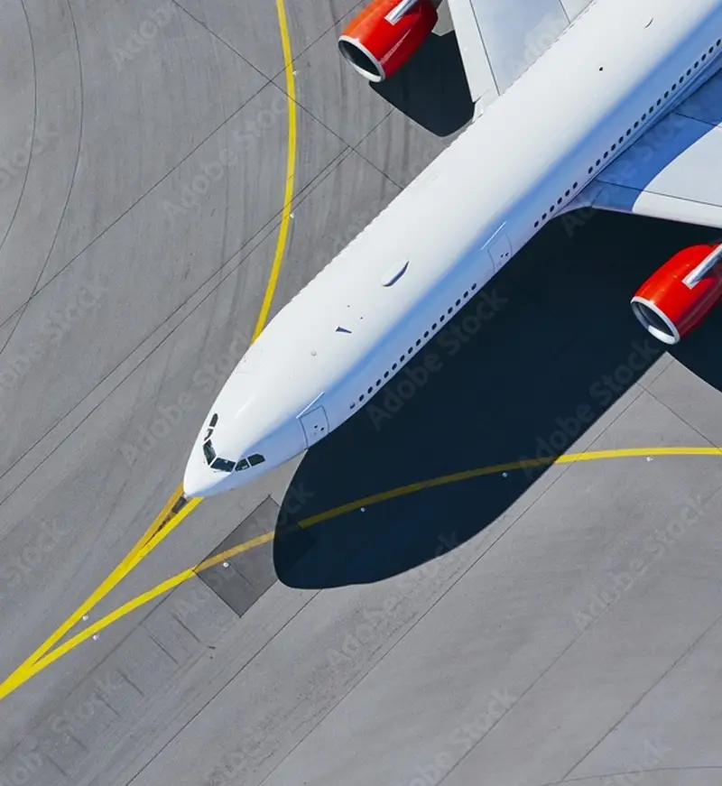 Aircraft on Brisbane Airport taxiway — airport freight pickups by City2Coast Couriers